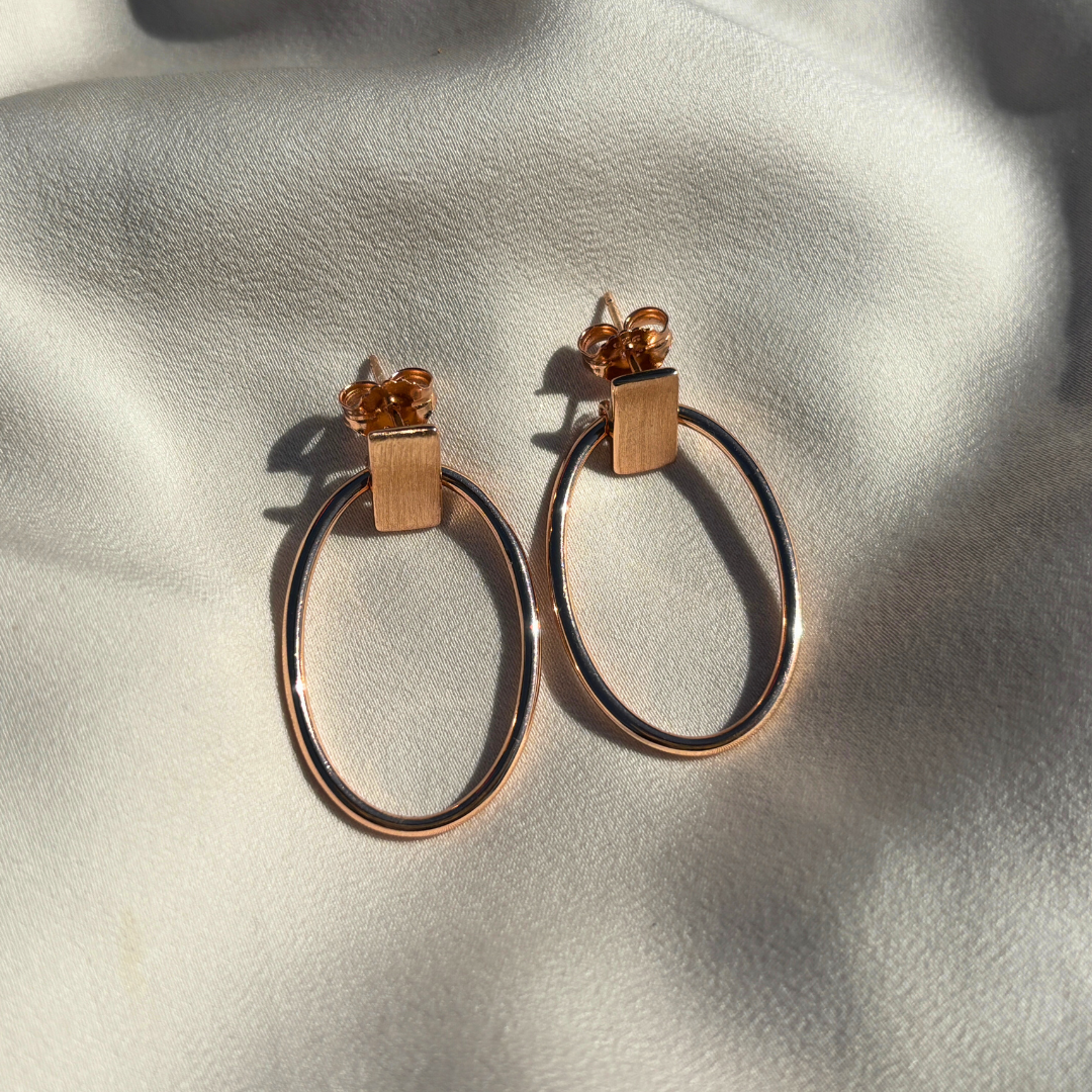 Sculpted Oval Hoop Earrings in Sterling Silver with a Touch of Rose Gold Plating