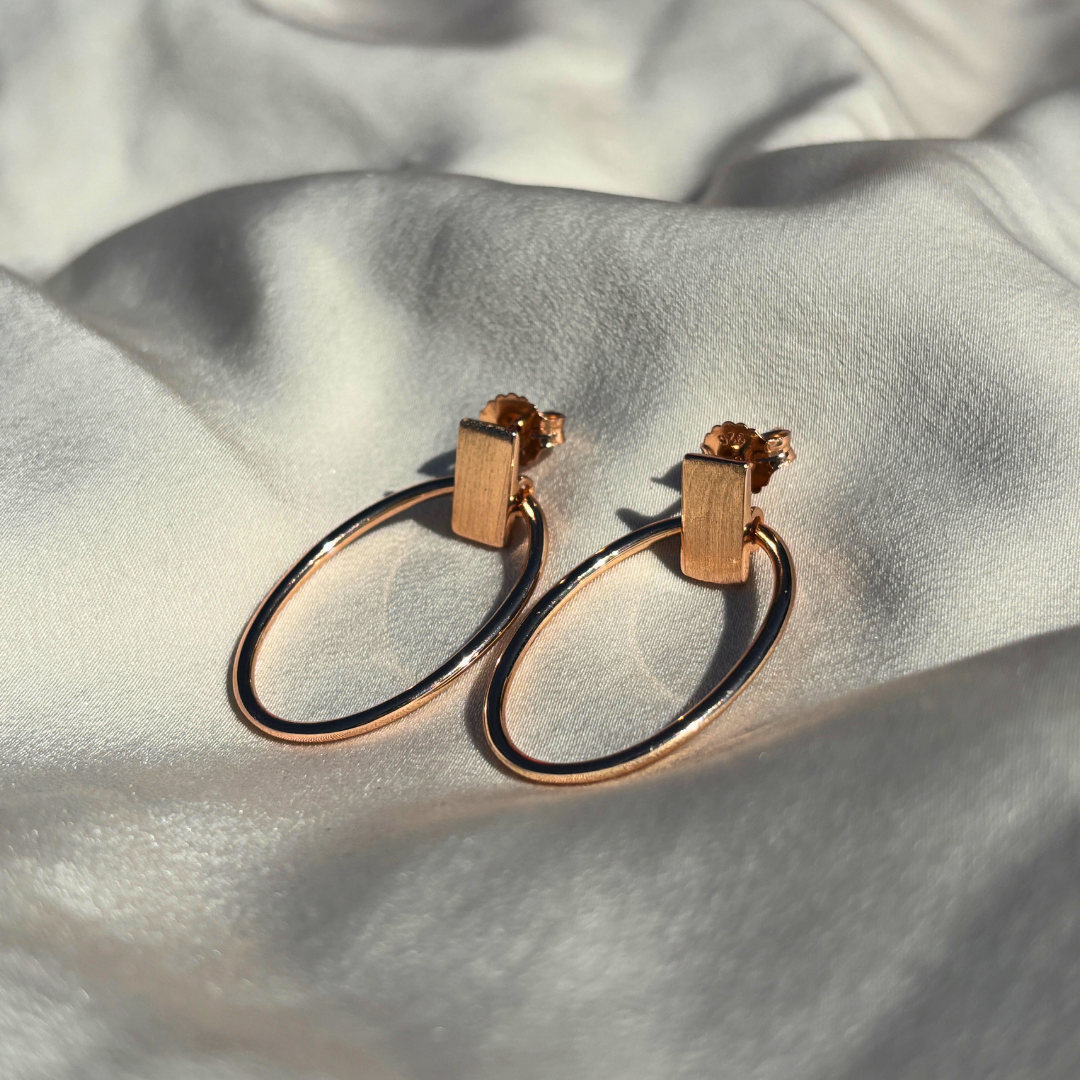 Sculpted Oval Hoop Earrings in Sterling Silver with a Touch of Rose Gold Plating